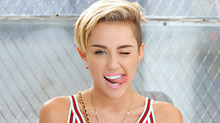 Miley Cyrus posa completamente desnuda para portada de libro